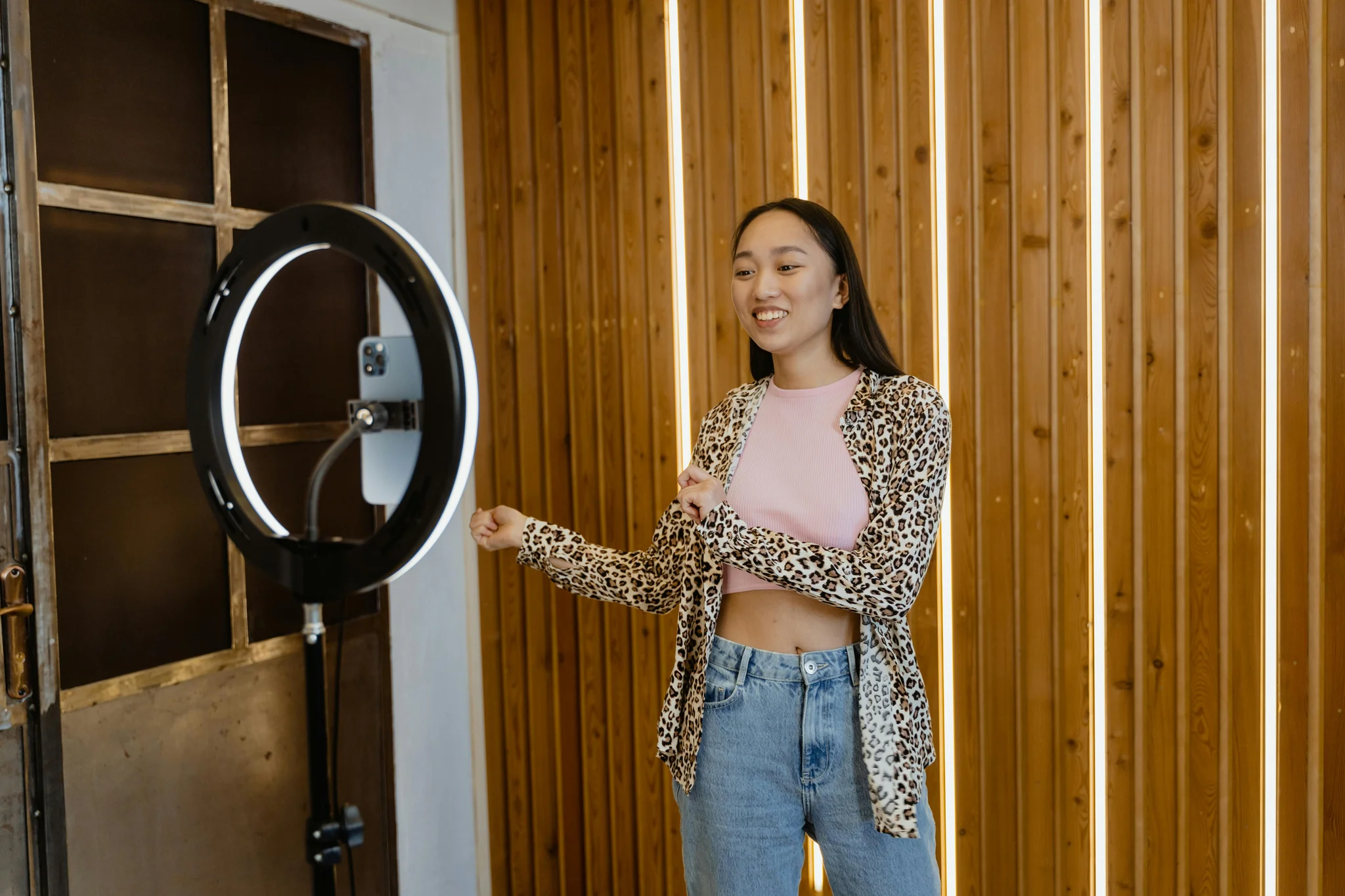 Professional creating video content on laptop